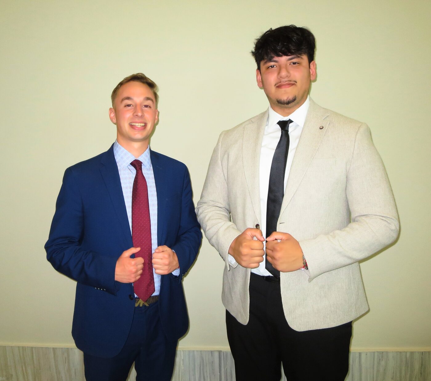 Two Risin Enterprises team members at a company event